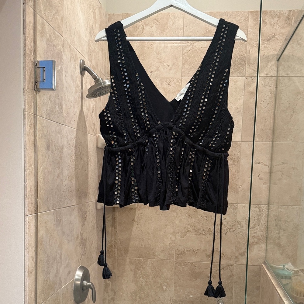 Chic Black Sleeveless Blouse with Tassel Accents